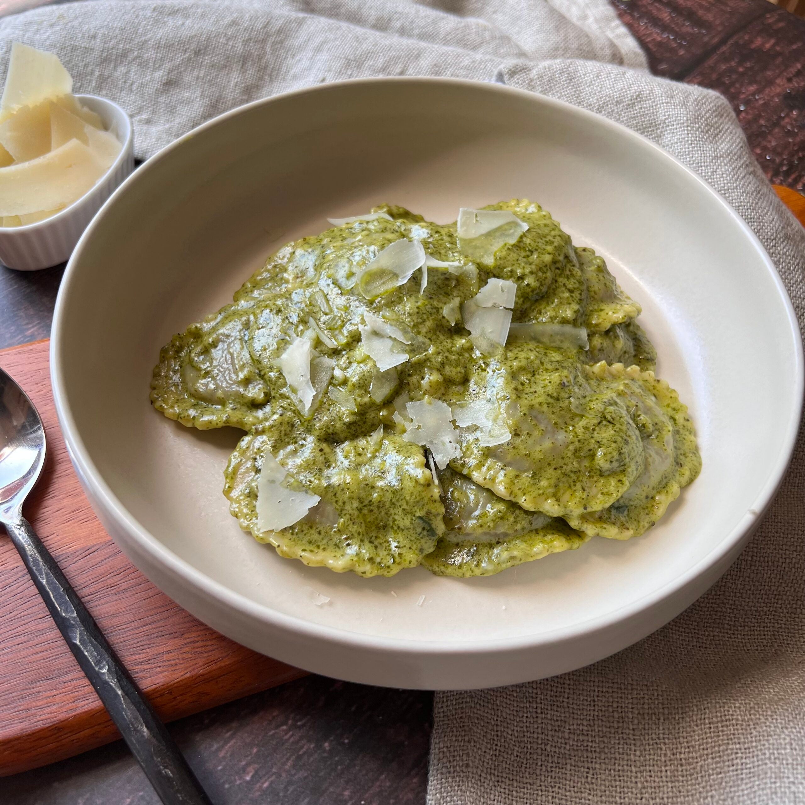 Tender Greens & Spring Herb Ravioli with Pesto Sauce