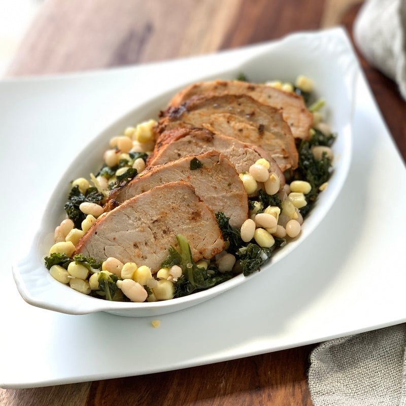 Pork Tenderloin over Braised Kale, Corn & White Bean Succotash