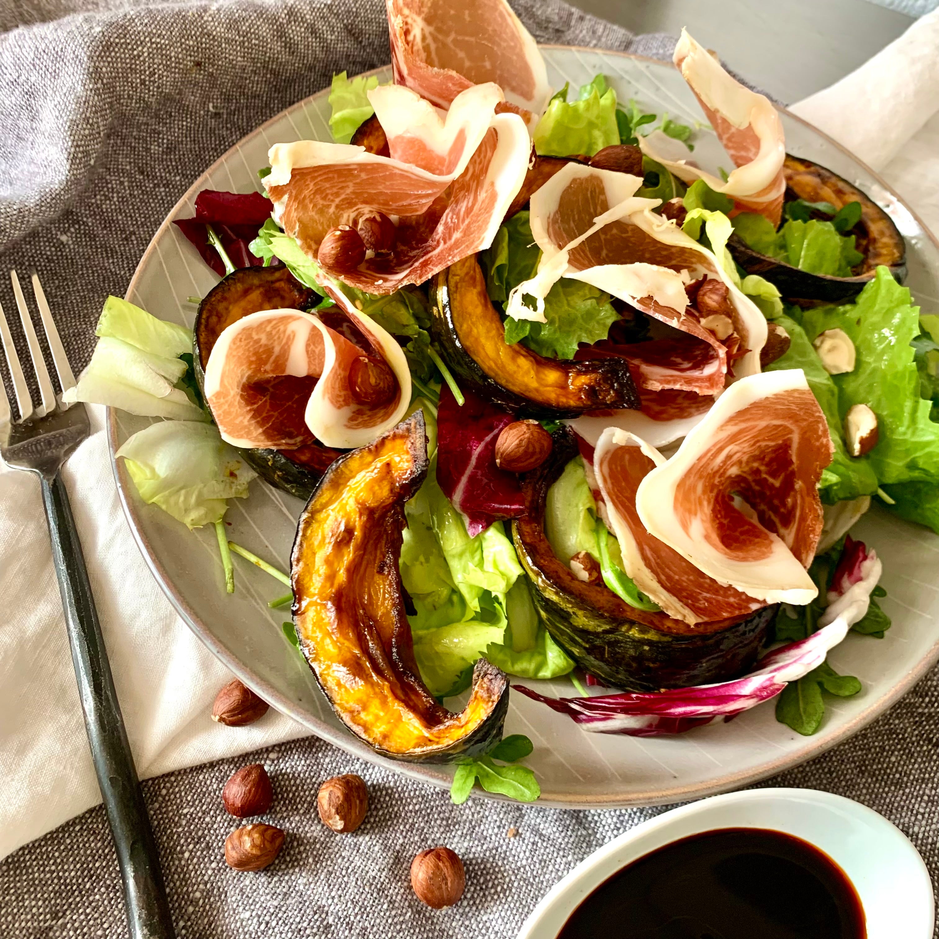 Roasted Kabocha Squash Chicory Salad with Culatello and Hazelnut